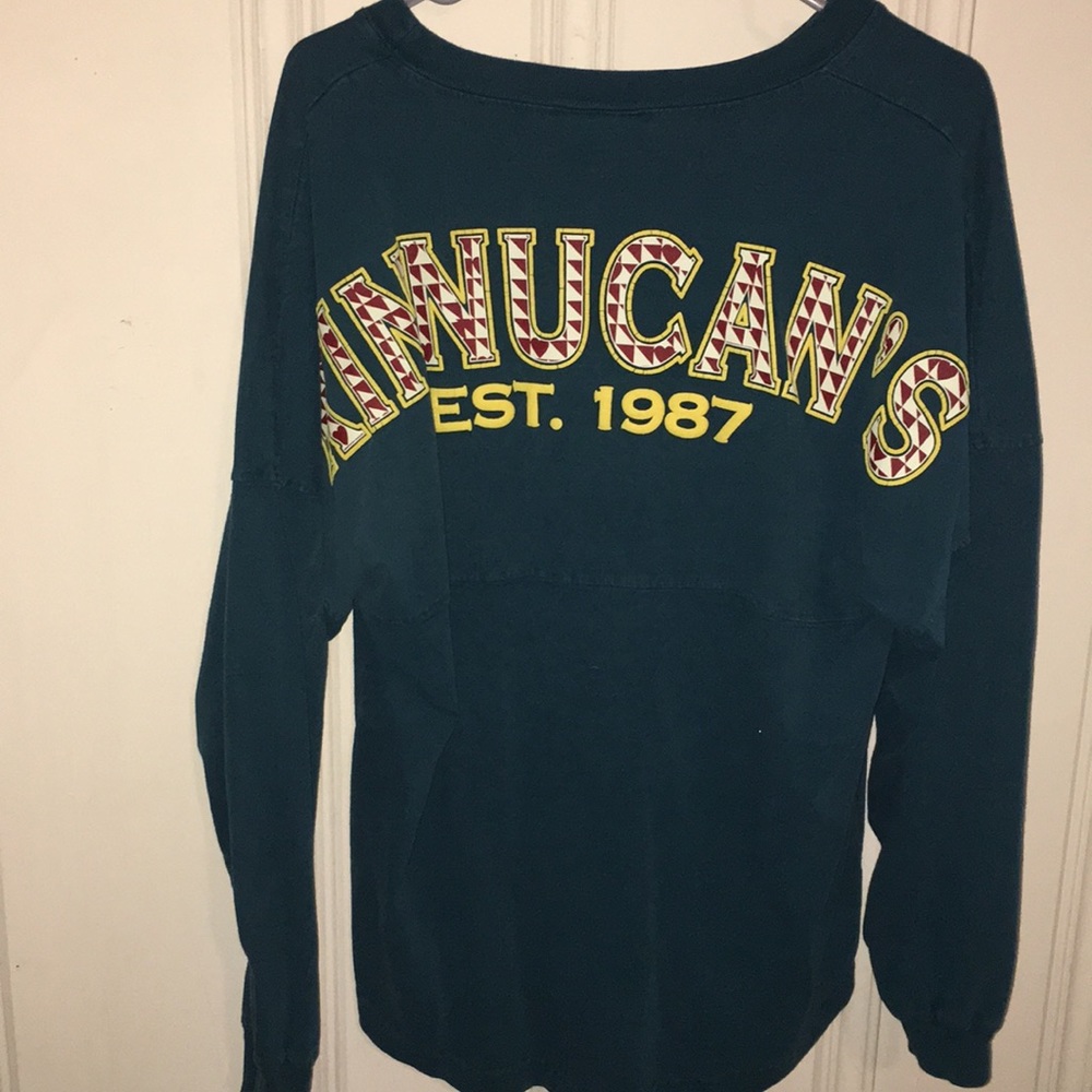 Kinnucan’s teal spirit jersey